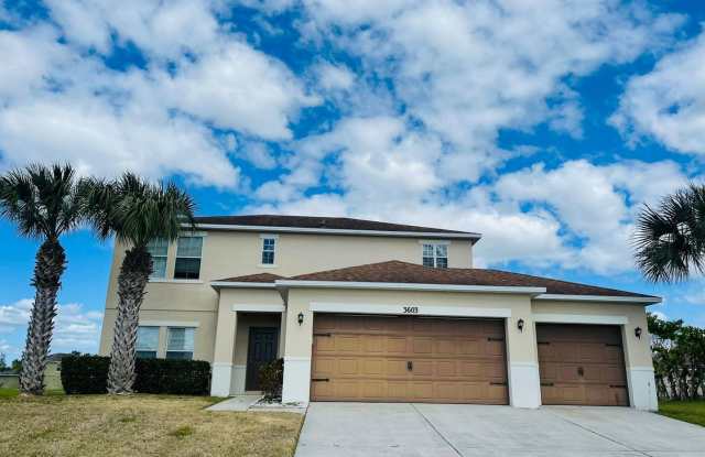 Brand new 4 bed 2 1/2 bath house in gated community Isles of Bellalago photos photos