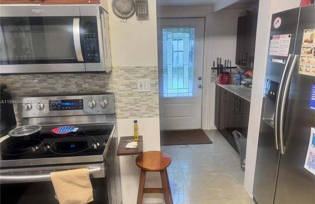 1261 NE 209th Ter photos photos