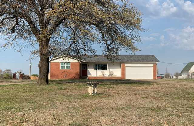 Situated on approximately one acre, this property has recently been updated with new flooring, windows, paint, fixtures, a new roof, and HVAC system. Gallery 3