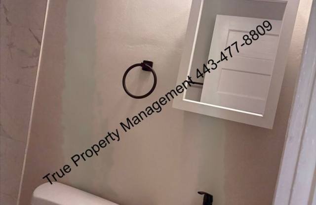 Spacious 3-Bedroom Baltimore Rowhome with In-Unit Laundry – $1,500/Month! Gallery 1