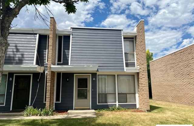 Charming Brick Two-Story Townhouse with Patio photos photos