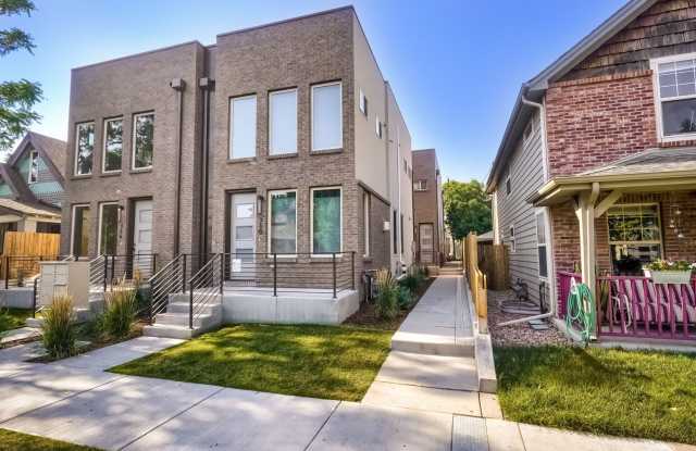 3 bedroom / 3.5 bath Townhome + 2 Large Flex Spaces & Spacious Roof Top Deck! Gallery 1