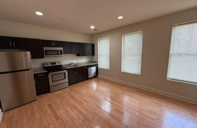 Spacious 4-Bedroom Apartment Near Clark Park with Central Air  In-Unit Laundry photos photos