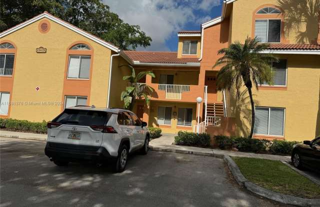 1062 Coral Ridge Drive - 1062 Coral Ridge Drive, Coral Springs, FL 33071