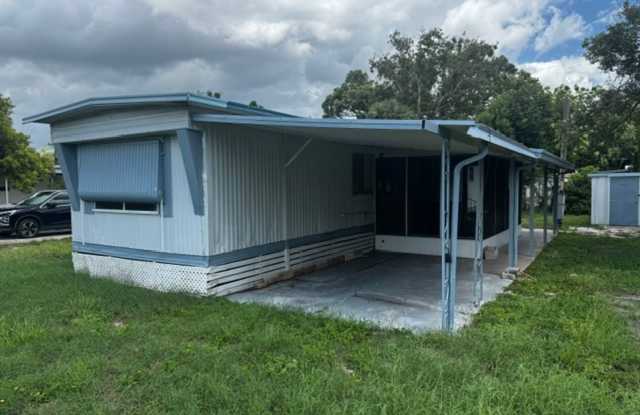 Updated 2BR Home in Port Richey with Carport & Immediate Move-In Available! photos photos Updated 2BR Home in Port Richey with Carport & Immediate Move-In Available! photos photos
