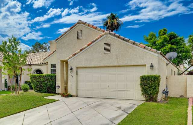 Single Story Home in Northwest Las Vegas with nicely Shaded Real Grass backyard and Community Pool Gallery 3