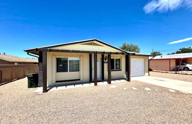 Furnished- Cute 2 Bedroom Home with Garage and Fully Fenced Yard! photos photos