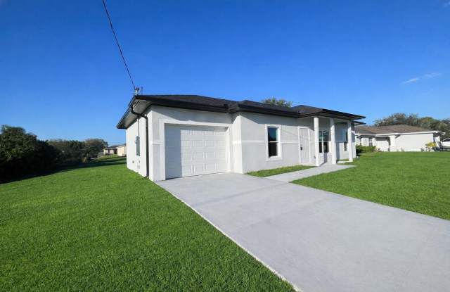 NEW CONSTRUCTION- Modern 3 Bed / 2 Bath Home in E Lehigh Acres photos photos