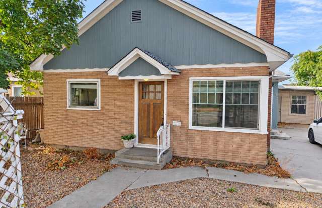 Spacious 3-Bedroom Home with Classic Charm, Sunroom & Private Backyard Gallery 1