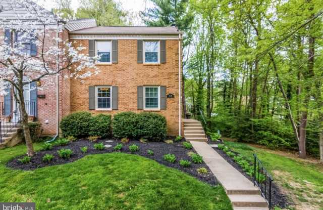 Spacious 3 bed and 3.5 bath end unit town house nestled on a quiet street in highly sought after Woodlynne. photos photos