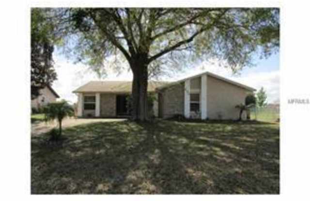 Poinciana home with large backyard photos photos