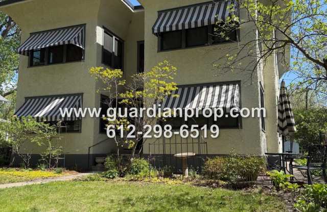 Bright Main Floor Unit Available July 1, Super Clean Building, Original Woodwork, Storage photos photos