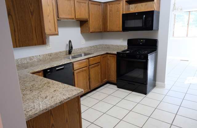Must see in person! Well maintained 3 Bed 2.5 bath condo in a very quiet location. 2 car detached. Full unfinished basement w/shelving. Gallery 3