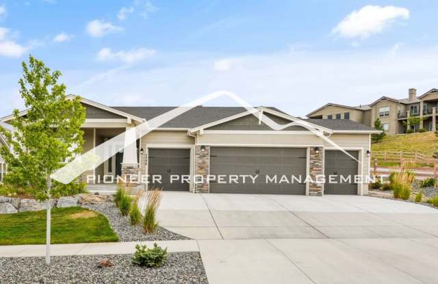 Main Floor Primary Home in Flying Horse with 5 Bedrooms, Gourmet Kitchen, Finished Basement & 4-Car Garage photos photos