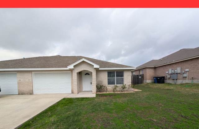 Large 3/2/2 Duplex with Easy Access to IH 35 for Commuters / Stained Concrete Floors  Carpet in Bedrooms / Fenced in Yard / CISD *2 weeks free rent off the first full month* photos photos