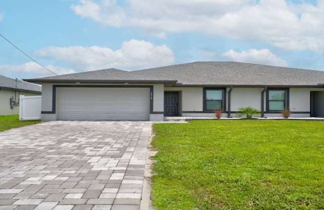 Large 3 bedroom 2 Bath Half Duplex with Yard Modern Built - 3419 Southwest 8th Place, Cape Coral, FL 33914