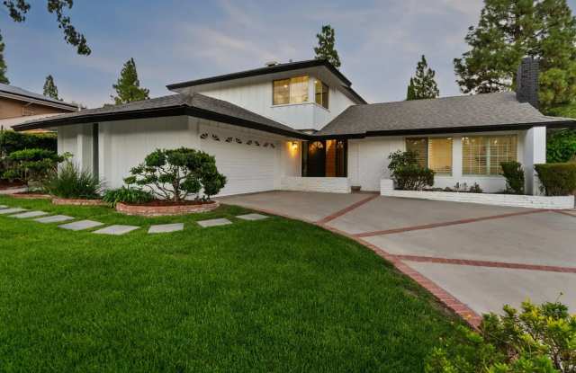 Beautifully reimagined residence in one of Porter Ranch's most desirable and established neighborhoods. Gallery 3