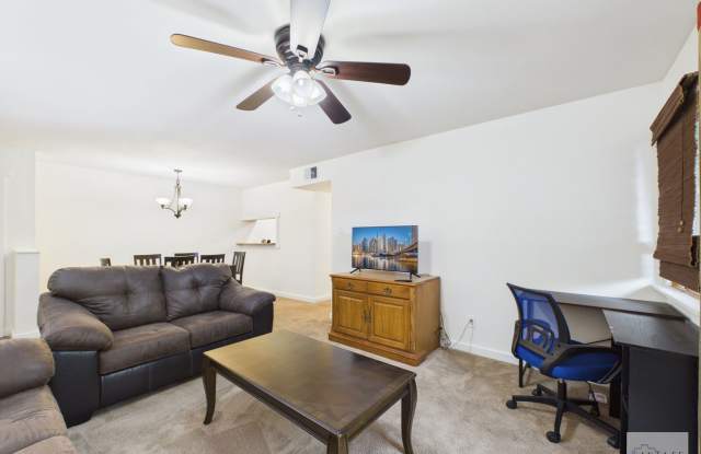 Fully Furnished or Unfurnished Ground Level Condo Available Now! Gallery 3