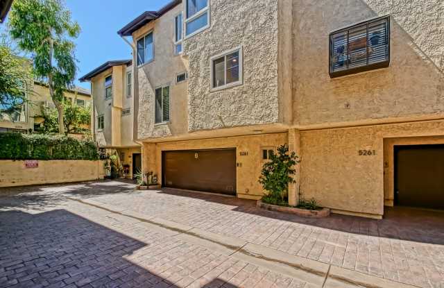 BRIGHT & AIRY, REAR-UNIT TOWNHOUSE W/ SPACIOUS PATIO, BALCONY & HUGE 2-CAR GARAGE IN GATED COMMUNITY W/ POOL & CLUBHOUSE! photos photos