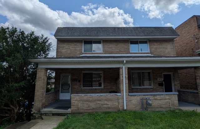 2 bed 1 bath home with large living room and yard! photos photos