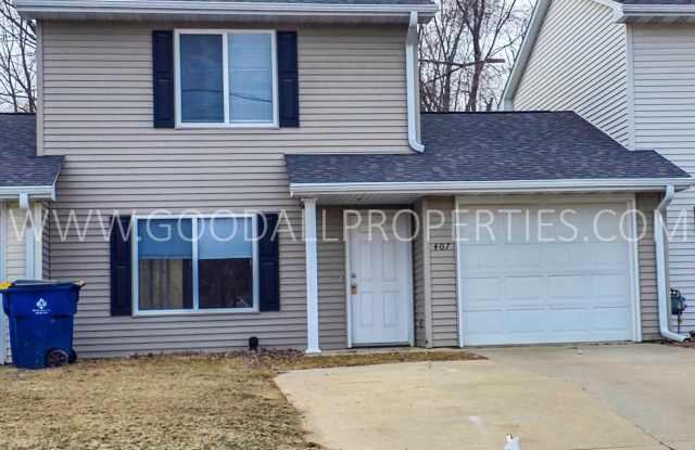 Rent Special $995 for the first 3 months of the lease!! 1.5-bath townhome in Van Meter, complete with an attached garage. photos photos