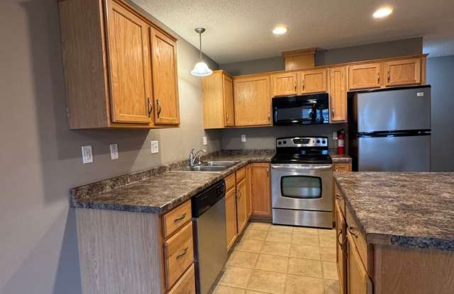 NW Townhouse Enjoy comfortable living in this 2-bedroom, 1.5-bathroom attached 1 car garage just in time for winter! Gallery 3