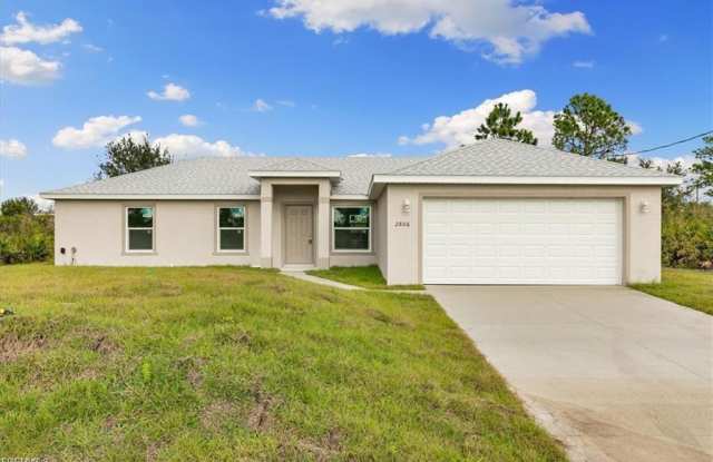 1064 Sunrise Boulevard - 1064 Sunrise Boulevard, Lehigh Acres, FL 33974