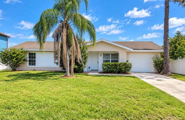 Spacious 3-Bedroom Poinciana Home with Vaulted Ceilings, Open Floor Plan & 2-Car Garage! photos photos