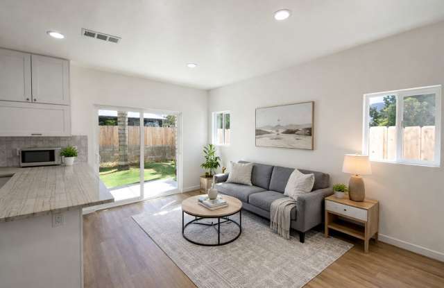 Newer Build! 4BD/2BA on 63rd Gallery 3