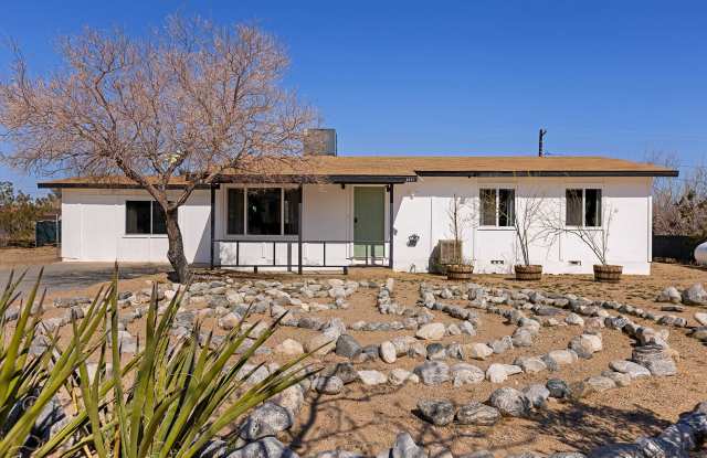 AVAILABLE NOW! BEAUTIFUL 3-bedroom, 2-bathroom home with Bonus Room in Joshua Tree! photos photos