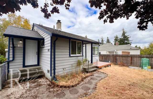 Charming Single-Story Home with Modern Updates, Detached Garage & Garden Bed Gallery 1