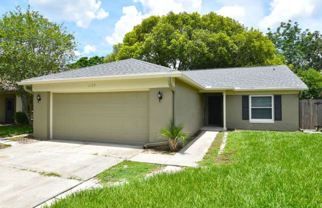 Water view 3/2 in Alafaya Woods. UPDATED kitchen and windows/doors.. photos photos