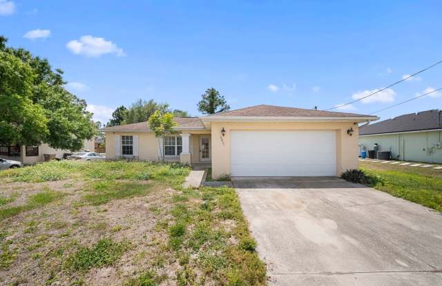 Spacious 3 bedroom 2 bathroom home in Lehigh Acres - New flooring! photos photos