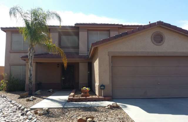 Immaculate 4 BR/ 2.5 Bath w/ a Pool and Hot Tub in Rita Ranch! photos photos