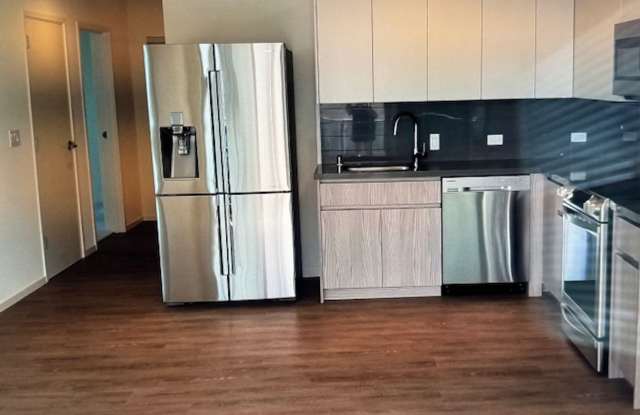 Modern end-unit with ocean views at Kapiolani Residence photos photos