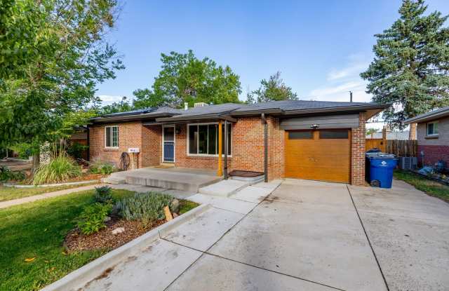 Spacious 4-Bedroom Home with Updated Kitchen, Finished Lower Level & Huge Backyard Gallery 1