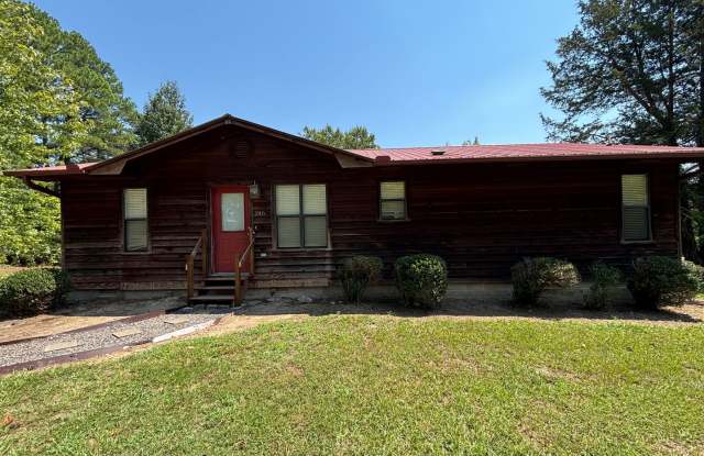 Located on the outskirts of Russellville, this three-bedroom, two-bath home photos photos