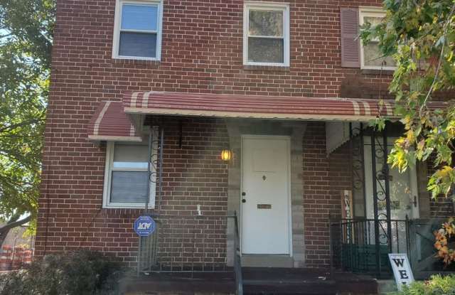 3 Bed, 1 Bath Townhouse with Fenced Yard, Hardwood Floors, and Fireplace - 6323 Brown Avenue, Baltimore, MD 21224