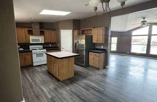 Spacious 4-Bedroom Home with Large Fenced Yard Gallery 1
