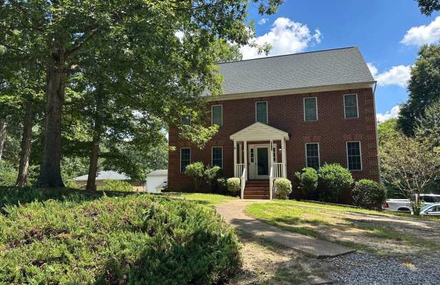 Brick Colonial with unfinished basement and attached garage photos photos