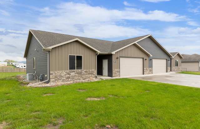 Stylish Living in a 3-Bed, 2-Bath Townhome with a 2-Car Garage photos photos