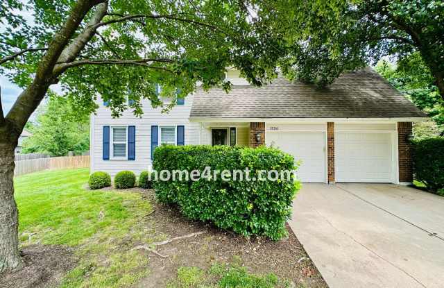 Blue Valley Schools w/ Hardwood Floors and a Spacious Fenced Yard! (2 Pet Max) photos photos