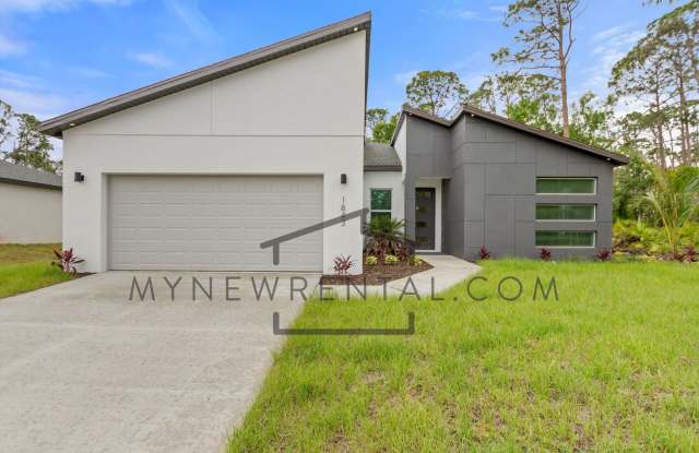 ONE MONTH FREE RENT! Modern, energy efficient home with ALL of the upgrades! North Port, FL - 1843 Greenley Road, North Port, FL 34286