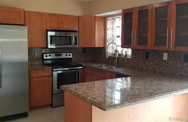10030 SW 147th Ct - 10030 Southwest 147th Court, The Hammocks, FL 33196