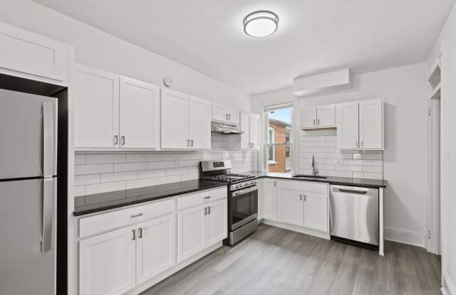 Spacious 1 Bedroom Apartment with Den - In Unit Laundry! photos photos