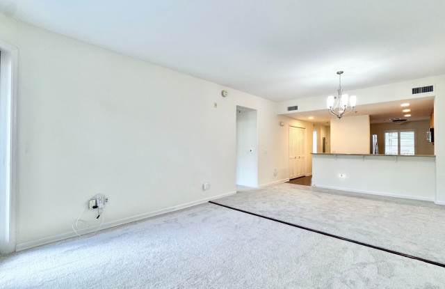 RARELY AVAILABLE 2 BD/2BA CONDO UNIT WITH 2 PARKING STALLS - COLONY AT THE PENINSULA photos photos
