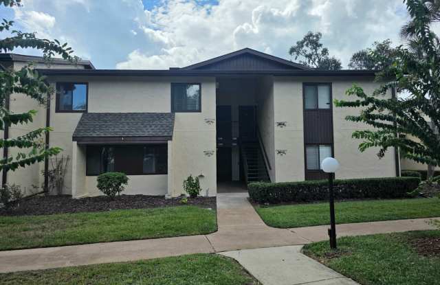 FURNISHED – Stunning Second-Floor Condo with Peaceful Lake Sparkle Views! photos photos
