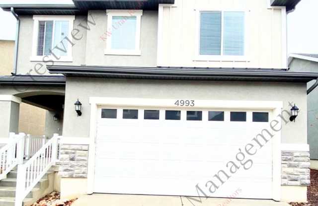 Spacious 3-Story Townhome with Open Living & 2-Car Garage photos photos