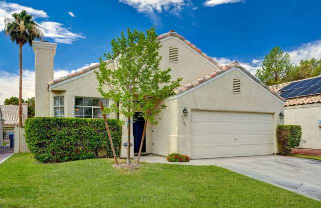 Single Story Home in Northwest Las Vegas with nicely Shaded Real Grass backyard and Community Pool Gallery 4