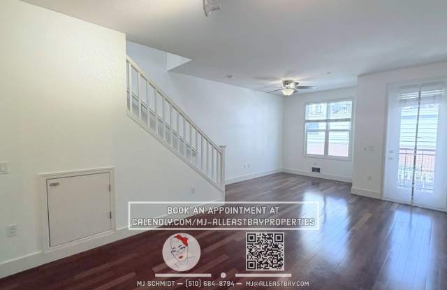 2-bed, 1.5-bath two-story condo, with rich hardwood floors, a modern kitchen, and spacious bedrooms with natural light. located above bustling Bay St. with shopping and restaurants steps away. Gallery 4